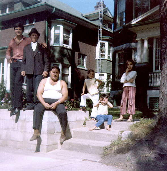 family in front of home after colour correction